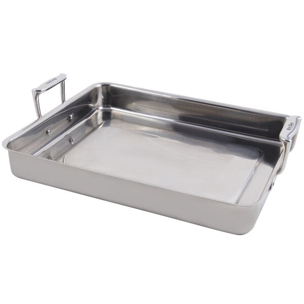 A silver stainless steel Bon Chef Cucina roasting pan with handles.