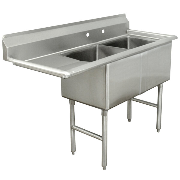 An Advance Tabco stainless steel commercial sink with two bowls and a left drainboard.