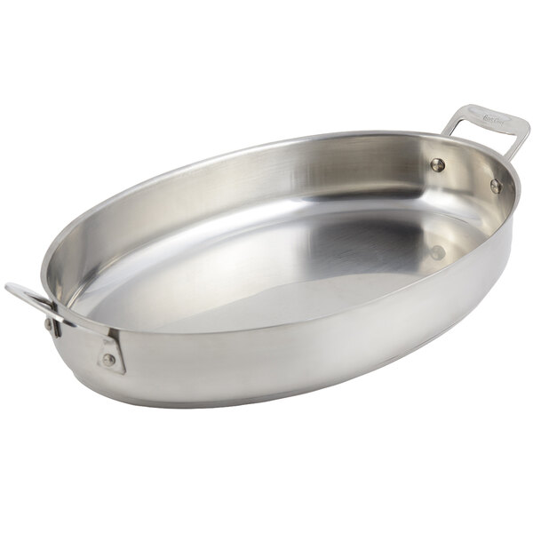 A silver stainless steel Bon Chef oval pan with handles.