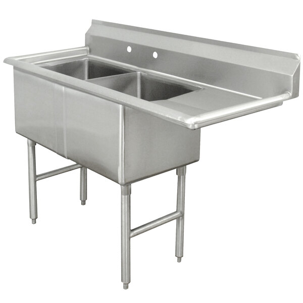 An Advance Tabco stainless steel two compartment sink with right drainboard.