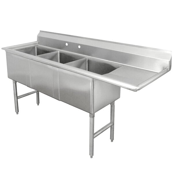 A stainless steel Advance Tabco three compartment sink with a right drainboard.