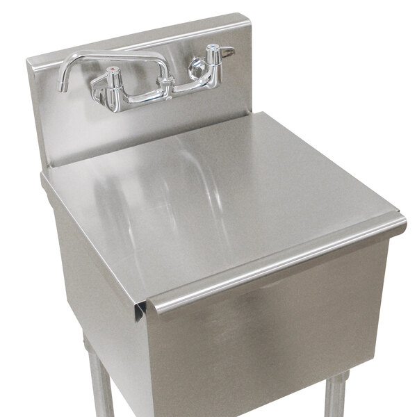 A stainless steel Advance Tabco sink compartment cover over a sink.