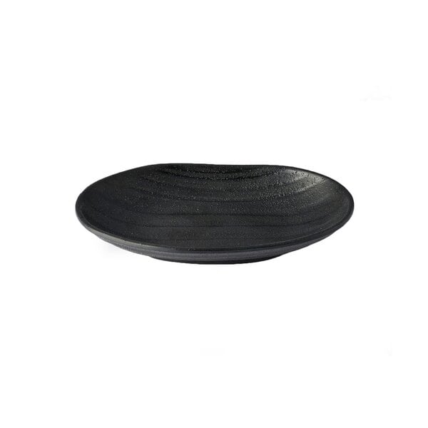 A black Elite Global Solutions Zen deep oval plate with wavy lines.