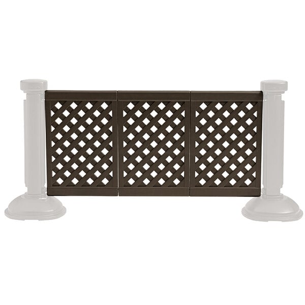A brown Grosfillex resin patio fence with a lattice pattern.
