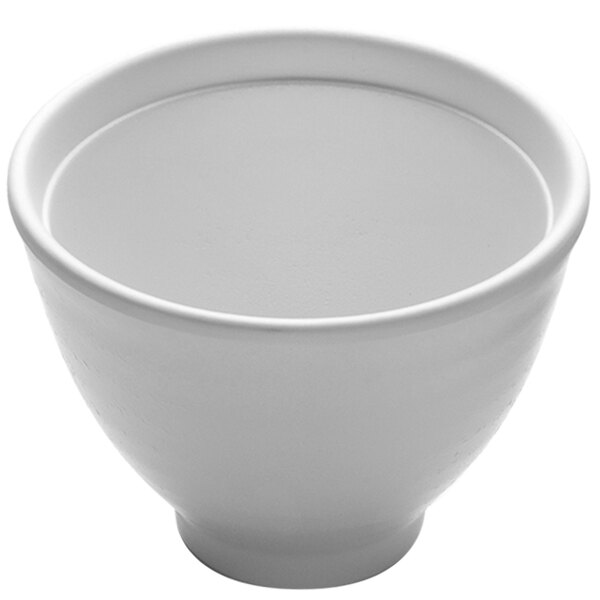 A close-up of a white Elite Global Solutions melamine soup bowl.