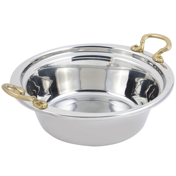 A stainless steel Bon Chef casserole food pan with round brass handles.