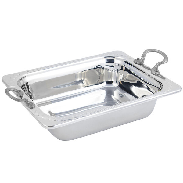 A silver rectangular Bon Chef stainless steel food pan with round handles.