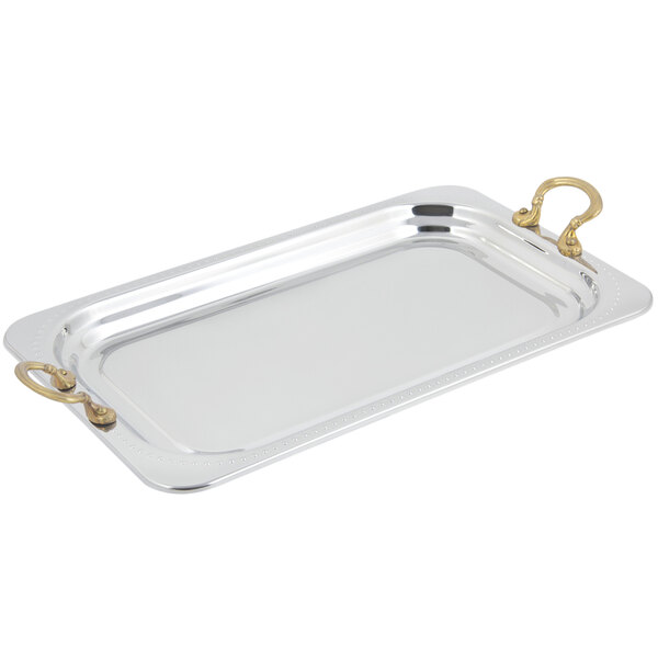 A silver rectangular Bon Chef food pan with round brass handles.