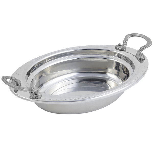 A stainless steel food pan with round handles.