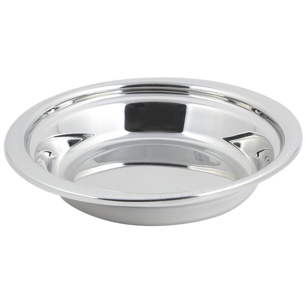 A Bon Chef stainless steel casserole food pan with Bolero design on the side.