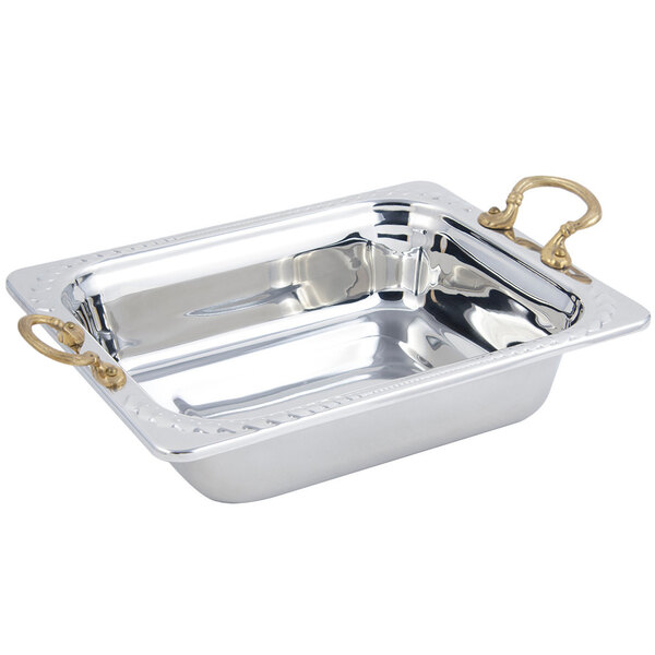 A silver rectangular Bon Chef food pan with brass handles.