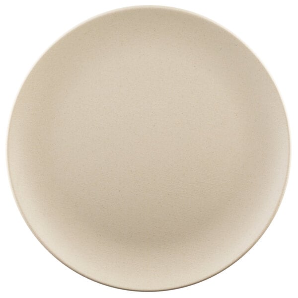 A close-up of an Elite Global Solutions Papyrus-colored round plate with a white background.