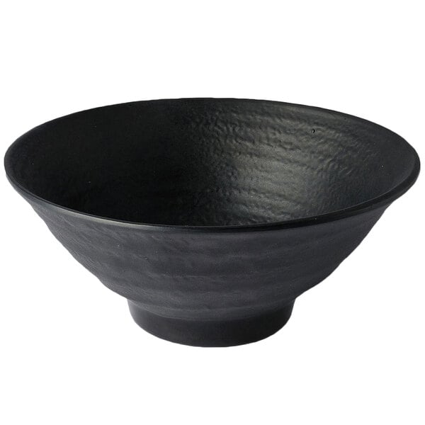 An Elite Global Solutions black melamine bowl with a black rim.