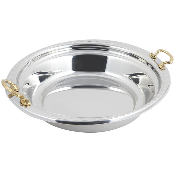 A stainless steel Bon Chef casserole food pan with round brass handles.