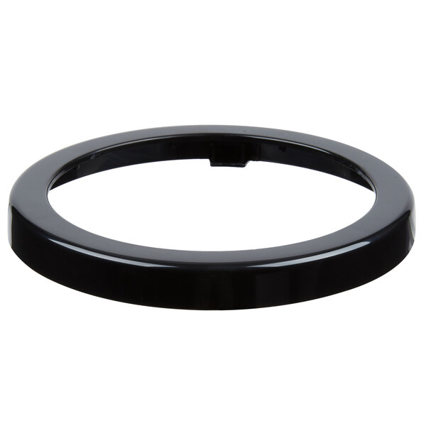 A black plastic San Jamar dispenser trim ring with a hole in the center.