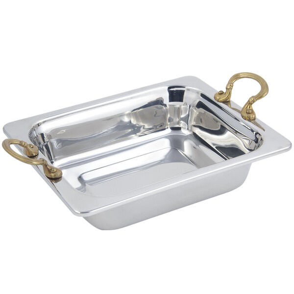 A silver rectangular food pan with round brass handles.