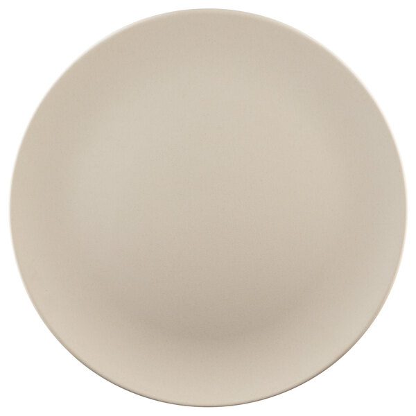 An Elite Global Solutions Papyrus-colored round melamine plate with a plain edge on a white surface.