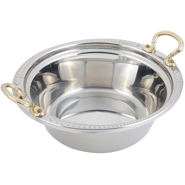 A silver Bon Chef stainless steel casserole food pan with round brass handles.