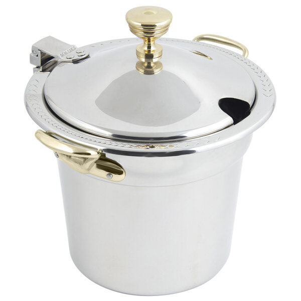 A silver stainless steel Bon Chef soup tureen with a lid and round brass handles.