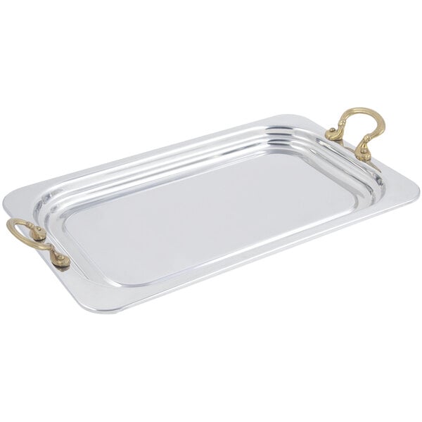 A Bon Chef stainless steel rectangular food pan with round brass handles.