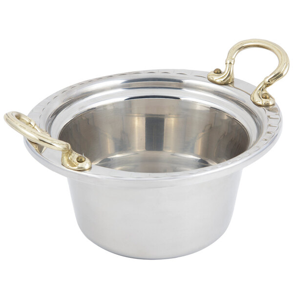 A silver stainless steel Bon Chef casserole with round brass handles.