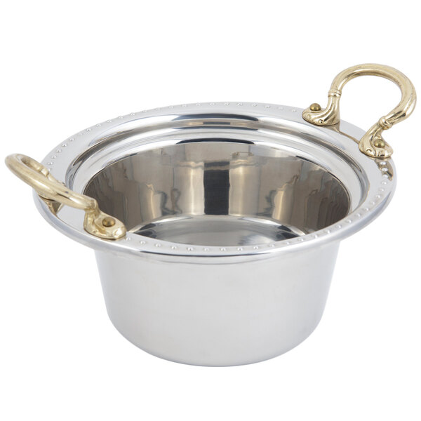 A silver stainless steel Bon Chef Bolero design casserole food pan with round brass handles.