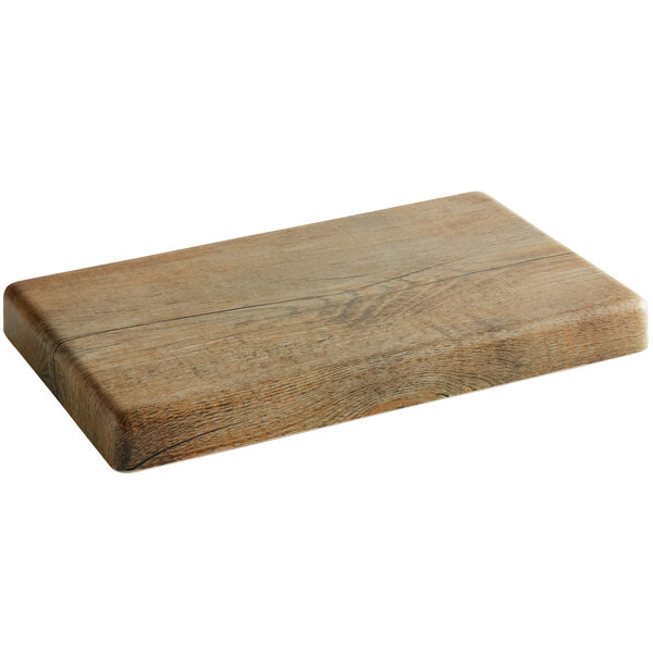 An Elite Global Solutions rectangular faux driftwood melamine riser with a wood grain finish.