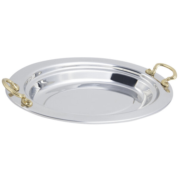 A silver Bon Chef food pan with round brass handles.