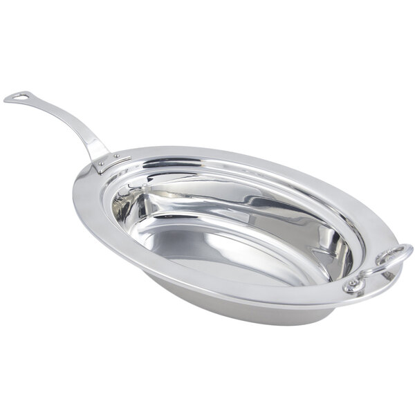 A stainless steel Bon Chef oval food pan with a long handle.