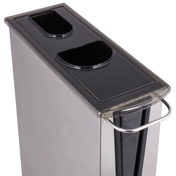 A silver trash can with a black lid.