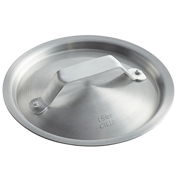 An aluminum pot / pan cover with a handle.