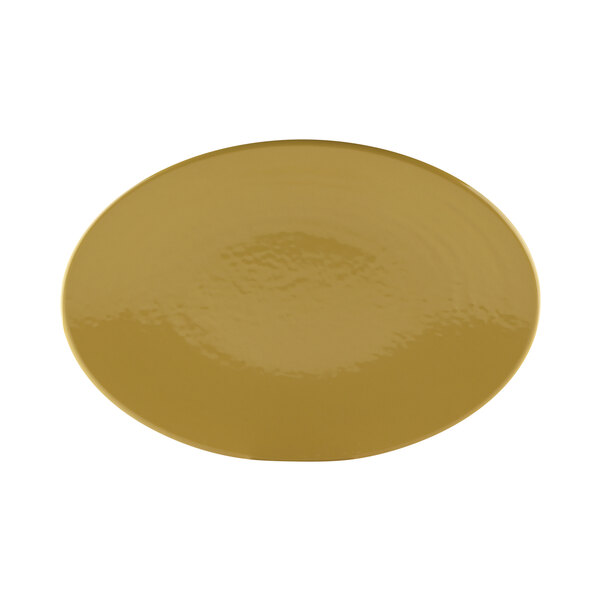 An olive oil-colored oval platter with a yellow circle in the middle.