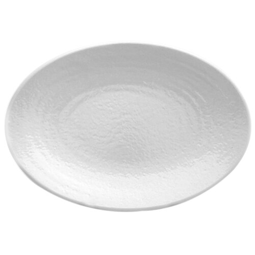 A white oval tray with a ripple pattern.