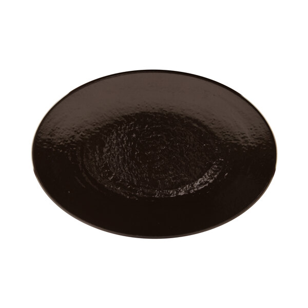 An aubergine oval platter with a circular design on it.