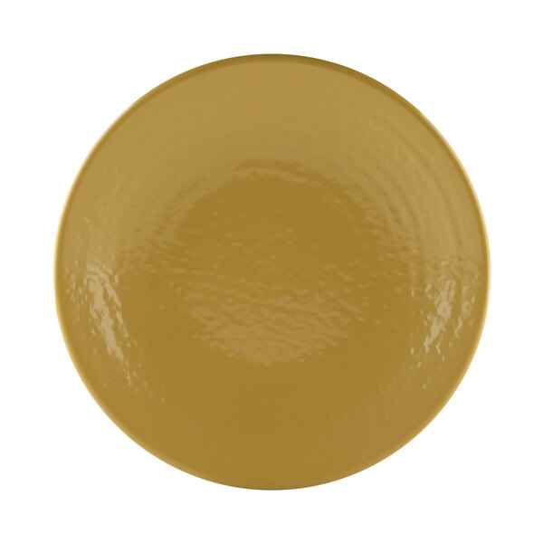 A yellow plate with a textured surface.