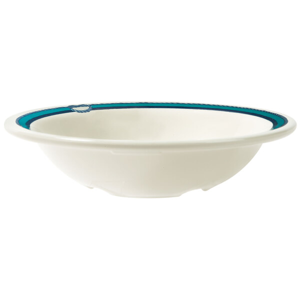 A white GET Freeport bowl with blue trim on the rim.