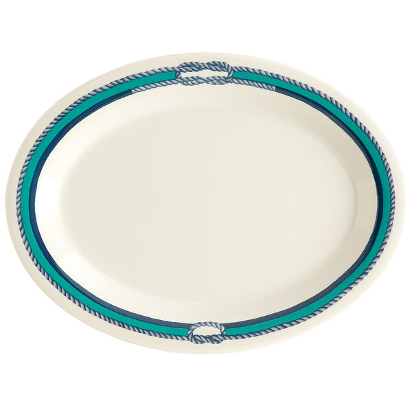 A white oval platter with blue and green border.