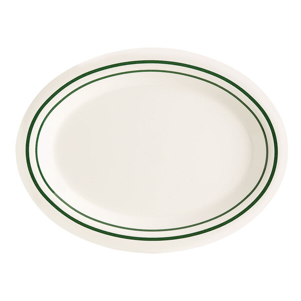 A white oval platter with green lines.
