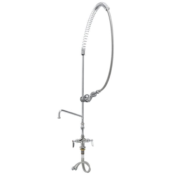 A T&S chrome deck mounted pre-rinse faucet with a hose and wall bracket.