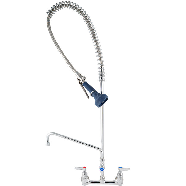 A T&S wall mounted pre-rinse faucet with a hose.