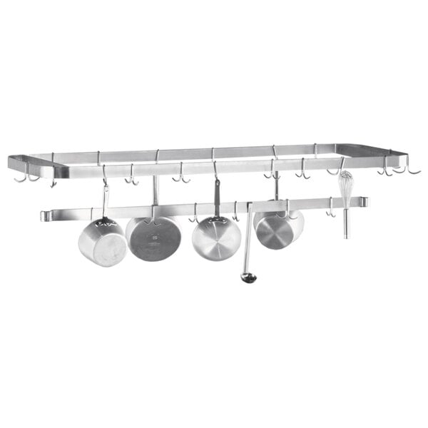 An Advance Tabco stainless steel pot rack with pots and pans mounted on a table.