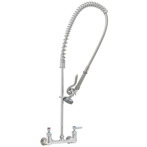 A T&S stainless steel wall-mounted pre-rinse faucet with a hose.