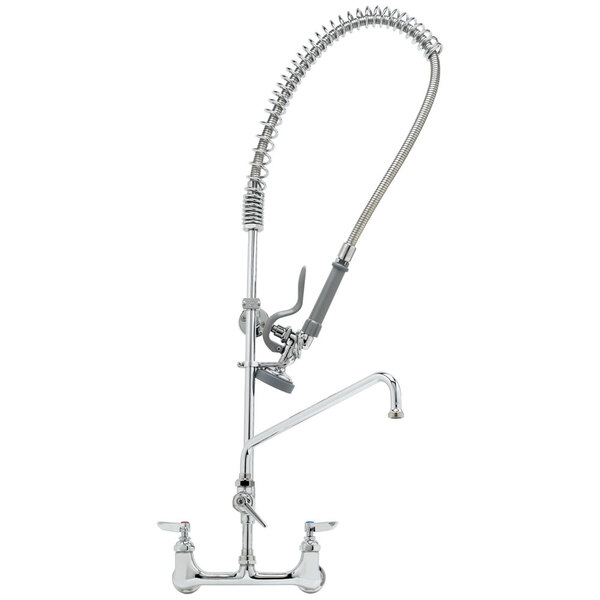 A T&S chrome pre-rinse faucet with a hose attached.