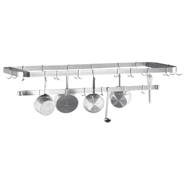 A stainless steel Advance Tabco pot rack holding pots and pans.