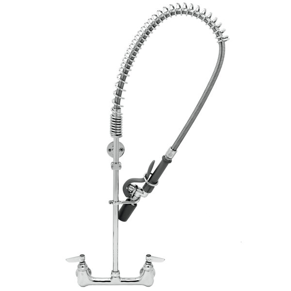 A chrome T&S pre-rinse faucet with a curved hose attached.