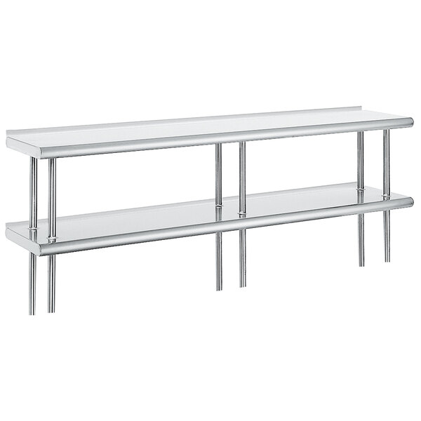 A white rectangular table with a stainless steel Advance Tabco double deck shelving unit on it.