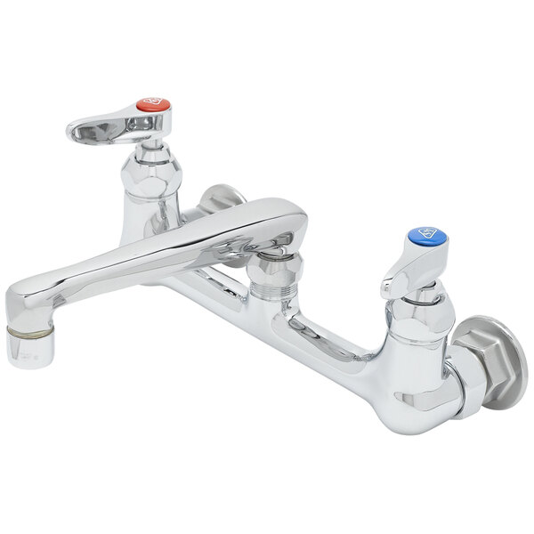A chrome T&S wall mount pantry faucet with two handles and two faucets.