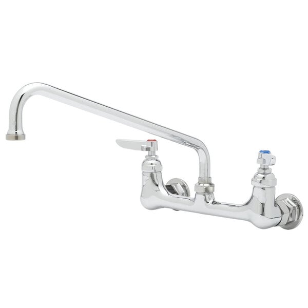A T&S chrome wall mounted pantry faucet with two handles and a hose.