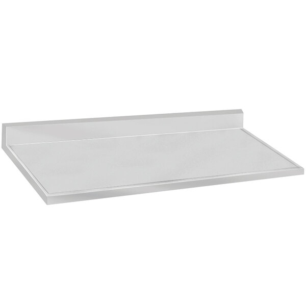 An Advance Tabco stainless steel countertop with a white rectangular object with a white border.