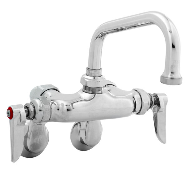 A chrome T&S wall mounted pantry faucet with a handle and a hose outlet.
